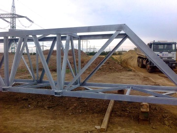 Ocelové příhradové konstrukce pro stožáry a břevna rozvodny a transformátorovny v Prosenicích – projekt její rozšíření.