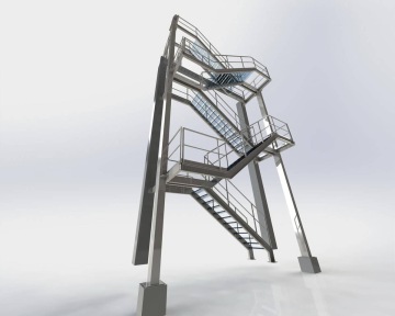 Ocelové požární schodiště se zábradlím na šedém pozadí.