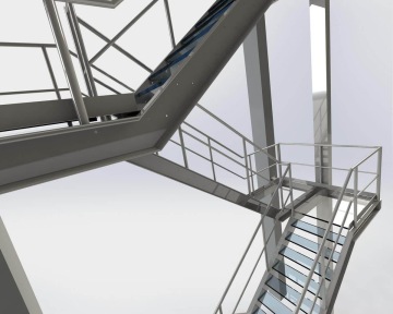 Moderní kovové schodiště s průhlednými stupni a zábradlím ve světlem prostoru.